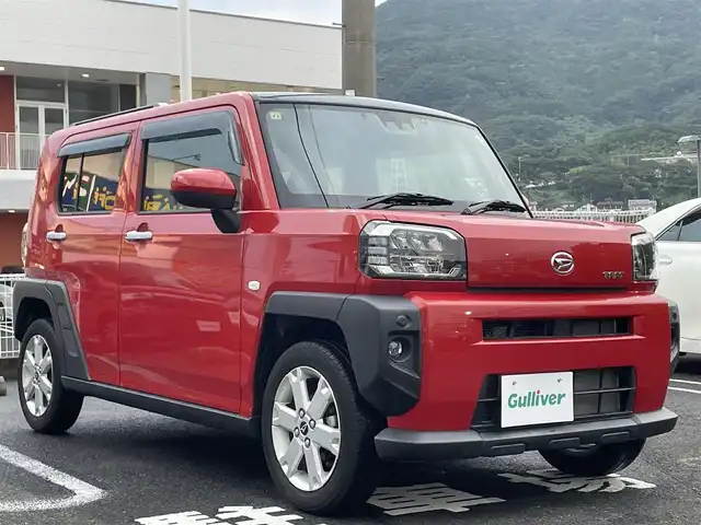 ダイハツ タフト G 長崎県 2020(令2)年 1万km コンパーノレッド 純正ディスプレイオーディオ/（AM、FM、AUX、USB、applecarplay、androidauto）/バックカメラ/プッシュスタート/衝突軽減システム/横滑り防止/コーナーセンサー/アイドリングストップ/１２Vシガーソケット/２．１A　USB/ＤＮ席シートヒーター/電子パーキング/オートホールド/先行車発進ブザー/車線逸脱警報/標識認識ブザー/ステアリモコン/AAC/ガラスルーフ/電格ミラー/ドアバイザー/純正フロアマット/ABS/Wエアバッグ/純正AW/スマートキー/ETC/保証書/取説/ワンオーナー