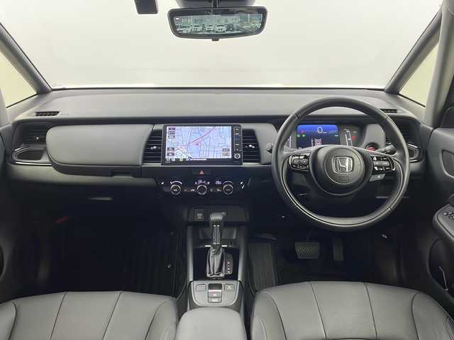 ホンダ フィット e:HEVリュクス 栃木県 2024(令6)年 1.7万km クリスタルブラックパール ワンオーナー/純正ナビ/フルセグTV/AM/FM/Bluetooth/iPod/AUX/USB/バックカメラ/ホンダセンシング/CMBS（衝突軽減ブレーキ）/ACC（オートクルーズコントロール）/先行車発進お知らせ/路外逸脱抑制システム/レーンキープアシスト/標識認識機能/ETC/スマートキー/前後ドライブレコーダー/純正フロアマット/純正16インチAW/LEDヘッドライト/オートハイビーム/置くだけ充電/ハンドルヒーター/シートヒーター/保証書/取扱説明書/スペアキー