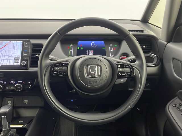 ホンダ フィット e:HEVリュクス 栃木県 2024(令6)年 1.7万km クリスタルブラックパール ワンオーナー/純正ナビ/フルセグTV/AM/FM/Bluetooth/iPod/AUX/USB/バックカメラ/ホンダセンシング/CMBS（衝突軽減ブレーキ）/ACC（オートクルーズコントロール）/先行車発進お知らせ/路外逸脱抑制システム/レーンキープアシスト/標識認識機能/ETC/スマートキー/前後ドライブレコーダー/純正フロアマット/純正16インチAW/LEDヘッドライト/オートハイビーム/置くだけ充電/ハンドルヒーター/シートヒーター/保証書/取扱説明書/スペアキー