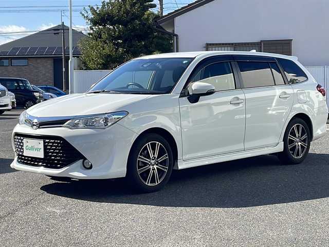 トヨタ カローラ フィールダー 1．5G エアロツアラー 愛知県 2015(平27)年 9.1万km スーパーホワイトⅡ ワンオーナー/純正オーディオ/【CD・ラジオ・AUX】/ビルトインETC/前後ドライブレコーダー/Toyota Safety Sense P/【プリクラッシュセーフティシステム・レーンディパーチャーアラート】/横滑り防止機能/アイドリングストップ/プッシュスタート/スマートキー/スペアキーあり/電動格納ミラー/ウィンカーミラー/フォグランプ/純正トノカバー/ステアリングスイッチ/純正フロアマット/純正ドアバイザー/新車保証書/取扱説明書