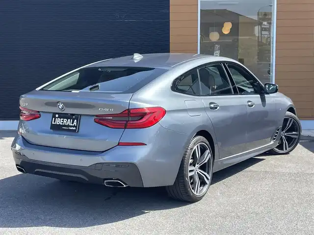 ＢＭＷ ６４０ｉ xDrive グランツーリスモ Mスポーツ 栃木県 2018(平30)年 6.6万km ブルーストーン コンフォートパッケージ/　・ソフトクローズドア/　・シートベンチレーション/　・マッサージシート/　・コンフォートシート/ヘッドアップディスプレイ/4輪アダプティブエアサスペンション/4ゾーンエアコン/BMWジェスチャーコントロール/ワイヤレスチャージング/ドライビングアシストプラス/パーキングアシストプラス/アダプティブLEDヘッドライト/ハイビームアシスタント/HiFiスピーカー/本革シート/シートヒーター/電動リアゲート/リアモニター