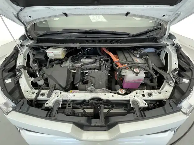 トヨタ ヴォクシー ハイブリッド ZS 煌Ⅲ 滋賀県 2021(令3)年 12.2万km ホワイトパールクリスタルシャイン 禁煙車/純正9インチナビ/CD.DVD.Bluetooth.フルセグ/バックカメラ/衝突軽減ブレーキ/クルーズコントロール/両側パワースライドドア/コーナーセンサー/ハーフレザーシート/前席シートヒーター/ETC/前方ドライブレコーダー/LEDヘッドライト/オートハイビーム/オートライト/スマートキー/スペアキー