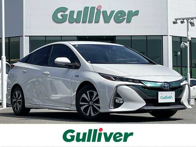 トヨタ プリウス ＰＨＶ S ナビパッケージ 佐賀県 2018(平30)年 7.6万km ホワイトパールクリスタルシャイン プラグインハイブリッド/純正11.6インチメモリーナビゲーション/・フルセグTV/AM/FM/USB/Bluetooth/バックカメラ/前方ドライブレコーダー/ビルトインETC2.0/DN席シートヒーター/ISOFIX対応/革巻きステアリング/ステアリングヒーター/ステアリングリモコン/純正LEDヘッドライト/純正フォグランプ/純正フロアマット/クルーズコントロール/レーンディパーチャーアラート