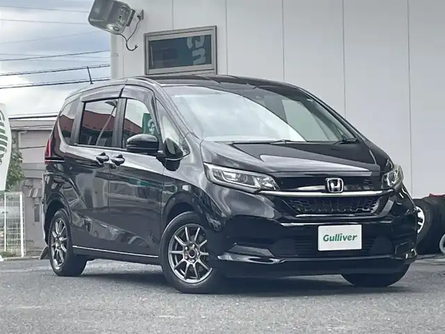 ホンダ フリード G ホンダセンシング 宮城県 2020(令2)年 4.5万km クリスタルブラックパール ワンオーナー/純正メモリナビ/DVD/CD/FM/AM/i Pod/USB/BT/AUX/フルセグTV/バックカメラ/前席シートヒーター/ステアリングスイッチ/両側パワースライドドア/前後ドライブレコーダー/純正スチール冬タイヤ15インチ/社外アルミ夏タイヤ15インチ/純正フロアマット/追従型クルーズコントロール/レーンアシスト/フロントワイパーデアイサー/衝突被害軽減システム/横滑り防止機能/アイドリングストップ/電動格納ミラー/ウィンカードアミラー/LEDライト/ETC/プッシュスタート/保証書・記録簿・取扱説明書