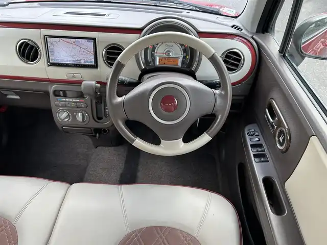 スズキ ラパン ショコラ G 島根県 2015(平27)年 4.9万km フェニックスレッドパール 社外ナビ/ワンセグ/ＤＶＤ再生/オートライト/純正キセノンヘッドライト/純正フロアマット/純正14インチアルミホイール/プッシュスタート/スマートキー