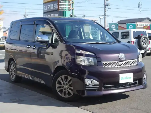 トヨタ ヴォクシー ZS 煌 静岡県 2011(平23)年 13.4万km ボルドーマイカメタリック ワンオーナー/禁煙車/両側パワースライド/純正HDDナビ（NHZN-W60G)/CD/DVD/BT/HDD/フルセグTV/AUX/SD/純正フリップダウンモニター/ビルトインETC/バックカメラ/2列目回転シート/純正フロアマット/純正ドアバイザー/スマートキー2個/プッシュスタート/純正HIDヘッドライト/オートライト/取扱説明書/保証書