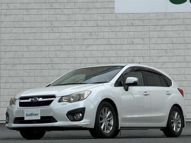 スバル インプレッサ スポーツ 2．0i アイサイト 岩手県 2013(平25)年 13.7万km サテンホワイトパール 禁煙車/4WD/追従型クルーズコントロール/純正ナビ/→ワンセグTV/Bluetooth/CD/DVD/FM/AM/バックカメラ/ステアリングスイッチ/衝突軽減ブレーキ/レーンキープアシスト/横滑り防止装置/オートライト/フォグライト/〇プッシュスタート/〇電動格納ミラー/〇ウィンカーミラー/〇ドアバイザー/〇フロアマット/〇パドルシフト/〇スマートキー/デジタルインナーミラー/ETC2.0/冬タイヤ純正アルミホイール車載