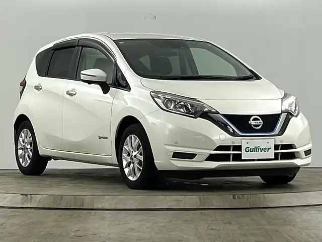 日産 ノート e－パワー X Vセレクション 愛知県 2020(令2)年 8万km ブリリアントホワイトパール 純正ＳＤメモリナビ【MM319D-W】/（Bluetooth・フルセグ・CD・DVD）/インテリジェントアラウンドビューモニター/インテリジェントエマージェンシーブレーキ/・車線逸脱警報/・踏み間違い防止/・フロント/バックソナー/ETC/ドライブレコーダー/インテリジェントルームミラー/純正6本スポーク15インチアルミホイール/横滑り防止機能/LEDヘッドライト/純正フロアマット/プッシュスタート/スマートキー