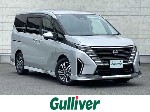 日産 セレナ e－パワー ルキシオン 群馬県 2023(令5)年 7.9万km ブリリアントシルバー 安全性能/・プロパイロット/・車線変更支援/・前方衝突防止支援/・踏み間違い衝突防止支援/・車線維持支援/・車線逸脱防止支援/・後側方衝突防止支援/・標識認識/・駐車支援/・プロパイロットパーキング/純正12.3インチナビ/　　フルセグ/Bluetooth/    FM/AM/USB/HDMI/    AppleCarPlay/AndroidAuto/フリップダウンモニター/アラウンドビューモニター/フロントダイナミックパック装着/両側ハンズフリーパワースライドドア/デジタルインナーミラー/1，2列目シートヒーター/オートLEDヘッドライト/ヘッドアップディスプレイ/ルーフスポイラー/シーケンシャルドアミラー/バックビュー雨滴クリーナー/スマートキー2本/プロパイロットリモートパーキング（キー有）/純正前後ドライブレコーダー/ビルドインETC2.0
