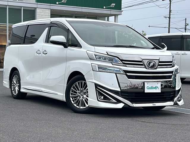 トヨタ ヴェルファイア V 香川県 2019(令1)年 2.7万km ホワイトパールクリスタルシャイン スペアキー/ワンオーナー/純正10インチナビ/（CD/DVD/SD/BT/フルセグTV/HDMI）/バックカメラ/ツインムーンルーフ/F S Rモデリスタエアロ　/パワーバックドア/ND席パワーシート /N席メモリーシート/ND席シートヒーター/ND席エアシート/レーダークルーズ/LTA/PKSB/PCS/RSA/レーダークルーズ/クリアランスソナー/トムスドアバイザー/純正フロアマット