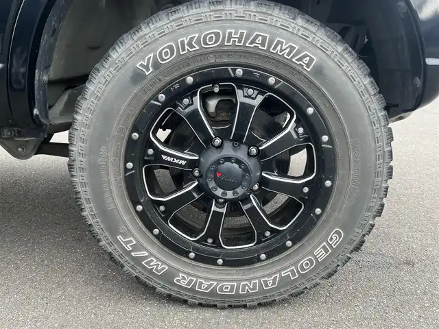 スズキ ジムニー ランドベンチャー 秋田県 2016(平28)年 4.2万km ブルーイッシュブラックパール3 純正ナビ/５速MT/LEDヘッドライト/４WD/ワンセグ/リモコンキー/社外アルミ/ETC/純正フロアマット/純正ドアバイザー/ステアリングスイッチ/電動格納ウィンカーミラー/パワーステアリング/パワーウィンドウ/レベライザー/背面タイヤ