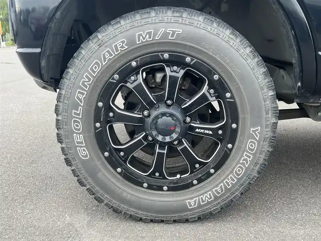 スズキ ジムニー ランドベンチャー 秋田県 2016(平28)年 4.2万km ブルーイッシュブラックパール3 純正ナビ/５速MT/LEDヘッドライト/４WD/ワンセグ/リモコンキー/社外アルミ/ETC/純正フロアマット/純正ドアバイザー/ステアリングスイッチ/電動格納ウィンカーミラー/パワーステアリング/パワーウィンドウ/レベライザー/背面タイヤ