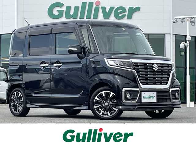 スズキ スペーシア カスタム HYBRID XS 佐賀県 2018(平30)年 5.6万km ミディアムグレーメタリック 社外SDナビ/・ワンセグTV/CD/DVD/Bluetooth/両側パワースライドドア/シートヒーター/ドライブレコーダー/プッシュスタート/スマートキー/ETC/純正15インチアルミ/純正LEDヘッドライト/純正フロアマット/横滑り防止装置/盗難防止装置