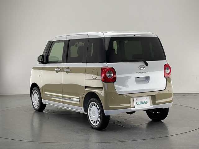 ダイハツ ムーヴ キャンバス ストライプス G 長野県 2023(令5)年 0.8万km シャイニングホワイトパール/サンドベージュメタリック 4WD/純正メモリナビ&フルセグTV&CD&DVD&USB&BT/車線逸脱警報/衝突軽減ブレーキ/後方コーナーセンサー/アイドリングストップ/両側パワースライドドア/前席シートヒーター/ステアリングスイッチ/ベンチシート/バックカメラ/ETC/LEDヘッドライト/オートライト/フロントフォグランプ/電動格納ミラー/電動ホールド/オートホールド/純正ホイールキャップ装着/純正フロアマット/プッシュスタート/スマートキー