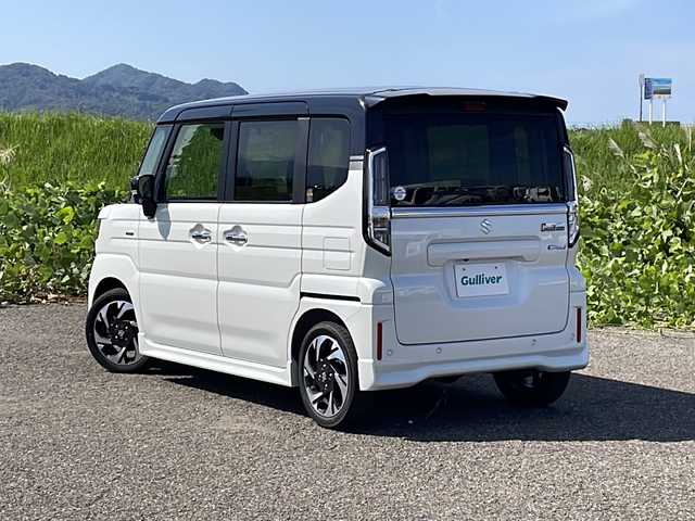 スズキ スペーシア カスタム HYBRID XS ターボ 新潟県 2024(令6)年 0.2万km ピュアホワイトパール/ブラック2トーン 4WD/純正メモリナビ/BT/USB/フルセグテレビ/全方位カメラ/衝突被害軽減ブレーキ/レーンキープアシスト/レーダークルーズコントロール/両側パワースライドドア/半革シート/ベンチシート/シートヒーター /ステアリングヒーター/ステアリングスイッチ/パドルシフト/コーナーセンサー/スマートキー/プッシュスタート/LEDヘッドライト/オートライト/オートハイビーム/フォグランプ/純正15インチアルミホイール