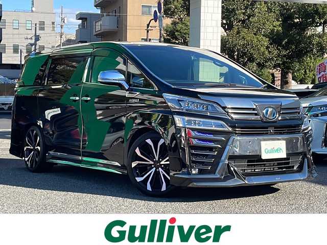 トヨタ ヴェルファイア ハイブリット エグゼクティブ ラウンジ Z 東京都 2019(平31)年 5.9万km ブラック 新車時保証書/取扱説明書/モデリスタエアロ/プリクラッシュセーフティー/レーダークルーズコントロール/パーキングサポートブレーキ/レーントレーシングアシスト/ブラインドスポットモニター/オートマチックハイビーム/純正ナビ/フルセグTV/SD/CD/DVD/BD/SDREC/USB/BT/AUX/JBLオーディオ/360度カメラ　ETC【2.0】/リヤフリップダウンモニター/デジタルインナーミラー/ドライブレコーダー【前後】/置く充電/AC100V1500W/レザーシート/シートヒーター/ベンチレーター/パワーシート【運転席メモリー付】/両側パワースライドドア/パワーバックドア/LEDヘッドライト/スマートキー×２/サイド/カーテン/ニーエアバック/インテリアイルミネーション/RS-Rサスペンションコイル/モデリスタ20インチアルミ