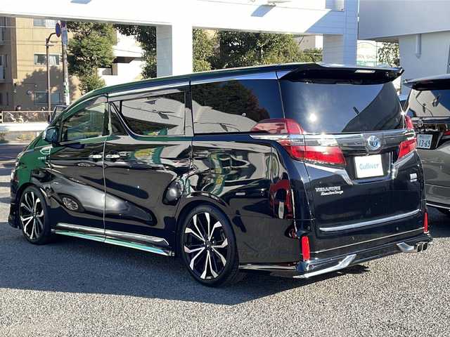 トヨタ ヴェルファイア ハイブリット エグゼクティブ ラウンジ Z 東京都 2019(平31)年 5.9万km ブラック 新車時保証書/取扱説明書/モデリスタエアロ/プリクラッシュセーフティー/レーダークルーズコントロール/パーキングサポートブレーキ/レーントレーシングアシスト/ブラインドスポットモニター/オートマチックハイビーム/純正ナビ/フルセグTV/SD/CD/DVD/BD/SDREC/USB/BT/AUX/JBLオーディオ/360度カメラ　ETC【2.0】/リヤフリップダウンモニター/デジタルインナーミラー/ドライブレコーダー【前後】/置く充電/AC100V1500W/レザーシート/シートヒーター/ベンチレーター/パワーシート【運転席メモリー付】/両側パワースライドドア/パワーバックドア/LEDヘッドライト/スマートキー×２/サイド/カーテン/ニーエアバック/インテリアイルミネーション/RS-Rサスペンションコイル/モデリスタ20インチアルミ
