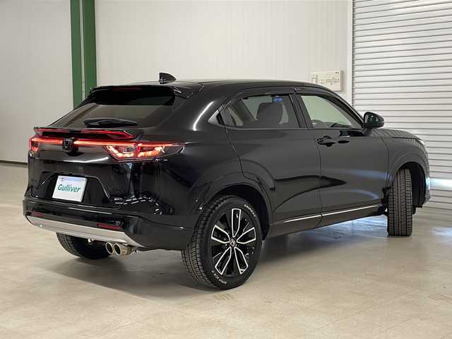 ホンダ ヴェゼル ハイブリッド e:HEV Z 熊本県 2023(令5)年 4.1万km クリスタルブラックパール 純正メモリナビ（フルセグＢｌｕｅｔｏｏｔｈ）/バックカメラ/アダプティブクルーズコントロール/ブラインドスポットモニター/レーンキープアシスト/ＬＥＤヘッドライト/ビルトインＥＴＣ/ミラー型ドラレコ/社外ウーファー/シートヒーター/置くだけ充電/パワーバックドア/フロアマット/ドアバイザー/プッシュスタート/スマートキー/スペアキー