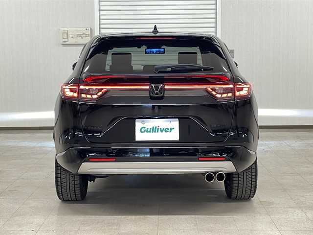 ホンダ ヴェゼル ハイブリッド e:HEV Z 熊本県 2023(令5)年 4.1万km クリスタルブラックパール 純正メモリナビ（フルセグＢｌｕｅｔｏｏｔｈ）/バックカメラ/アダプティブクルーズコントロール/ブラインドスポットモニター/レーンキープアシスト/ＬＥＤヘッドライト/ビルトインＥＴＣ/ミラー型ドラレコ/社外ウーファー/シートヒーター/置くだけ充電/パワーバックドア/フロアマット/ドアバイザー/プッシュスタート/スマートキー/スペアキー