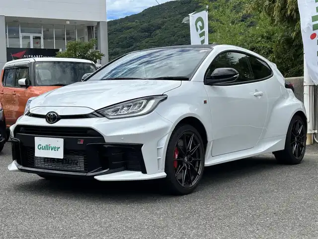 トヨタ ＧＲヤリス RZ ハイパフォーマンス 長崎県 2024(令6)年 0.7万km プラチナホワイトパールマイカ トヨタ純正ナビ（AM/FM/BT/TV）/4WD/バックカメラ/6速MT/ETC2.0/ステアリングスイッチ/オートライト/オートハイビーム/LDA/BSM/PCS/コーナーセンサー/RCTA/SEA/RSA/スペアキー/取扱説明書/マルチメディア取扱説明書/保証書/記録簿