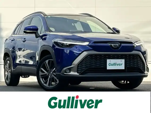 トヨタ カローラ クロス ハイブリッド Z 佐賀県 2024(令6)年 1.6万km ダークブルーマイカM パノラマルーフ/トヨタセーフティセンス/・プリクラッシュセーフティ/・レーダークルーズコントロール/・レーントレーシングアシスト/・オートマチックハイビーム/ブラインドスポットモニター/クリアランスソナー/純正10.5インチディスプレイオーディオ/・コネクティッドナビ/・バックカメラ/・フルセグTV/BT/ETC2.0/置くだけ充電/純正18インチAW/LEDヘッドライト/フォグランプ/ルーフレール/ハーフレザーシート/前席シートヒーター/運転席パワーシート/電動パーキングスイッチ/スペアキー×１/取扱説明書/保証書