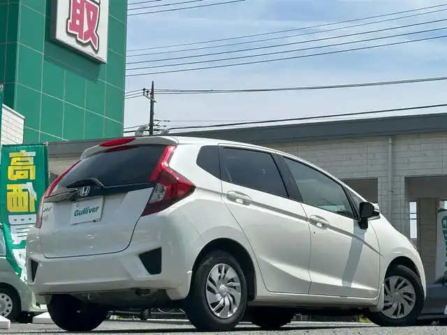 ホンダ フィット 13G Fパッケージ 東京都 2015(平27)年 10.3万km プレミアムホワイトパール 外部検査済み/純正SDナビ（VXM-155VSi）/・Bluetoothオーディオ/TV/DVD/バックカメラ/アイドリングストップ/スマートキー/プッシュスタート/ビルトインETC