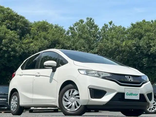 ホンダ フィット 13G Fパッケージ 東京都 2015(平27)年 10.3万km プレミアムホワイトパール 外部検査済み/純正SDナビ（VXM-155VSi）/・Bluetoothオーディオ/TV/DVD/バックカメラ/アイドリングストップ/スマートキー/プッシュスタート/ビルトインETC