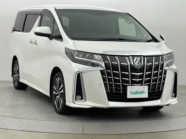 トヨタ アルファード S Cパッケージ 新潟県 2021(令3)年 4.9万km ホワイトパールクリスタルシャイン 4WD/フリップダウンモニター/純正ナビ/　　フルセグ/CD/DVD/BT/バックカメラ/両側パワースライドドア/パワーバックドア/レーダークルーズコントロール/3眼LED/オートマチックハイビーム/レザーシート/パワーシート/メモリーシート/シートヒーター/エアシート/オットマン/純正18インチアルミホイール/ステアリングスイッチ/ステアリングヒーター/スタッドレスタイヤ車載/スマートキー/ビルトインETC2.0