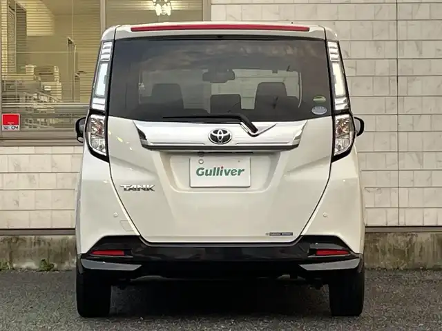 トヨタ タンク カスタムG－T 福岡県 2016(平28)年 9.4万km パールホワイトⅢ 純正SDナビ【NSZT-W66T】/(AM/FM/Bluetooth/CD/DVD/フルセグTV】/バックカメラ/ビルトインETC/両側パワースライドドア/スマートアシストII/・衝突警報機能(対車両・対歩行者)/・衝突回避支援ブレーキ機能(対車両)/・誤発進抑制制御機能/・後方誤発進抑制制御機能/・先行車発進お知らせ機能/クルーズコントロール/コーナーセンサー/盗難防止装置/横滑り防止機能/電格ウィンカーミラー/プッシュスタート/純正フロアマット/純正１５インチアルミホイール/ステアリングスイッチ/フロントフォグランプ/アイドリングストップ/ISOFIX/USB充電ソケット×１/スペアキー×１/ドアバイザー/取扱説明書/保証書