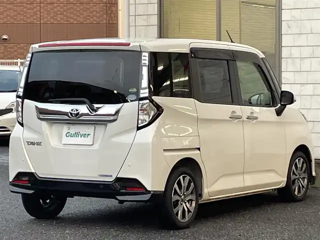 トヨタ タンク カスタムG－T 福岡県 2016(平28)年 9.4万km パールホワイトⅢ 純正SDナビ【NSZT-W66T】/(AM/FM/Bluetooth/CD/DVD/フルセグTV】/バックカメラ/ビルトインETC/両側パワースライドドア/スマートアシストII/・衝突警報機能(対車両・対歩行者)/・衝突回避支援ブレーキ機能(対車両)/・誤発進抑制制御機能/・後方誤発進抑制制御機能/・先行車発進お知らせ機能/クルーズコントロール/コーナーセンサー/盗難防止装置/横滑り防止機能/電格ウィンカーミラー/プッシュスタート/純正フロアマット/純正１５インチアルミホイール/ステアリングスイッチ/フロントフォグランプ/アイドリングストップ/ISOFIX/USB充電ソケット×１/スペアキー×１/ドアバイザー/取扱説明書/保証書