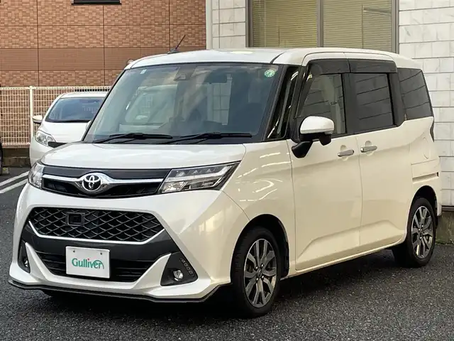 トヨタ タンク カスタムG－T 福岡県 2016(平28)年 9.4万km パールホワイトⅢ 純正SDナビ【NSZT-W66T】/(AM/FM/Bluetooth/CD/DVD/フルセグTV】/バックカメラ/ビルトインETC/両側パワースライドドア/スマートアシストII/・衝突警報機能(対車両・対歩行者)/・衝突回避支援ブレーキ機能(対車両)/・誤発進抑制制御機能/・後方誤発進抑制制御機能/・先行車発進お知らせ機能/クルーズコントロール/コーナーセンサー/盗難防止装置/横滑り防止機能/電格ウィンカーミラー/プッシュスタート/純正フロアマット/純正１５インチアルミホイール/ステアリングスイッチ/フロントフォグランプ/アイドリングストップ/ISOFIX/USB充電ソケット×１/スペアキー×１/ドアバイザー/取扱説明書/保証書