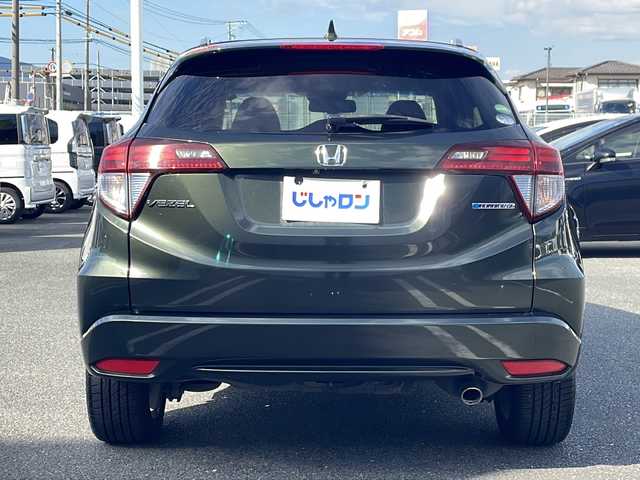 ホンダ ヴェゼル ハイブリッド Z 熊本県 2015(平27)年 9万km ミスティックグリーンパール (株)IDOMが運営する【じしゃロン熊本店】の自社ローン対象車両になります。こちらは現金ご利用時の価格です。自社ローンご希望の方は別途その旨お申付け下さい。/純正ナビ（ＣＤ　ＤＶＤ　フルセグＴＶ　ＢＴ）　/バックカメラ　/クルーズコントロール　/ビルトインＥＴＣ　/ジャズブラウン内装　/シートヒーター　/Ｗ＋サイドエアバッグ　/カーテンエアバッグ　/ルーフレール