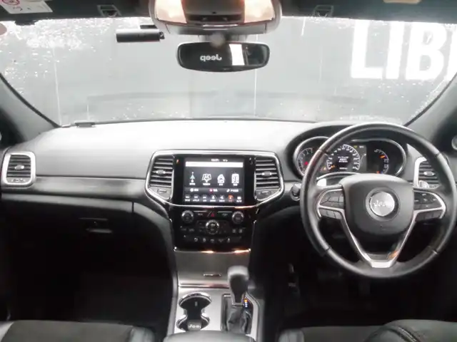 クライスラー・ジープ ジープ グランドチェロキー アルティテュード 岩手県 2020(令2)年 4.9万km ブライトホワイト 純正ナビ/フルセグTV/バックサイドカメラ/パークセンス/クルコン/前後ドラレコ/DSRC/ハーフレザー/パワーシート/シートヒーター/ラバーマット/サイドステップ/キャリパーカバー