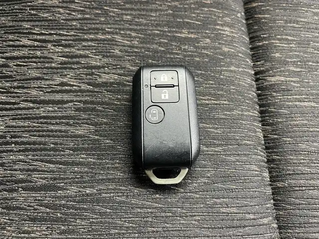 スズキ スペーシア カスタム HYBRID GS 富山県 2018(平30)年 2.4万km ピュアホワイトP 社外ナビ（AM/FM/CD/ワンセグ）/片側パワースライドドア/D席シートヒーター/横滑り防止装置/アイドリングストップ/オートLEDライト/フォグライト/純正アルミホイール/純正フロアマット/電動格納ミラー/スマートキー/スペアキー