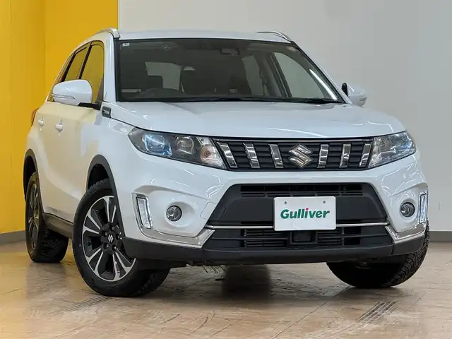 スズキ エスクード 1．4 ターボ 群馬県 2020(令2)年 4.4万km クールホワイトパール スズキセーフティサポート/デュアルセンサーブレーキサポート/誤発信抑制機能/アダプティブクルーズコントロール/車線逸脱警報機能/車線逸脱抑制機能/ふらつき警報機能/先行車発進お知らせ機能/ブラインドスポットモニター/ヒルディスタートコントロール/ヒーテッドドアミラー/純正8インチナビ/　フルセグ/BT/CD/DVD/SD/USB/4WD/シートヒーター/ハーフレザーシート/LEDヘッドライト/フォグランプ/バックカメラ/純正フロアマット/純正17インチAW/ステアリングスイッチ/パドルシフト/ETC/ドライブレコーダー/プッシュスタート/スマートキー