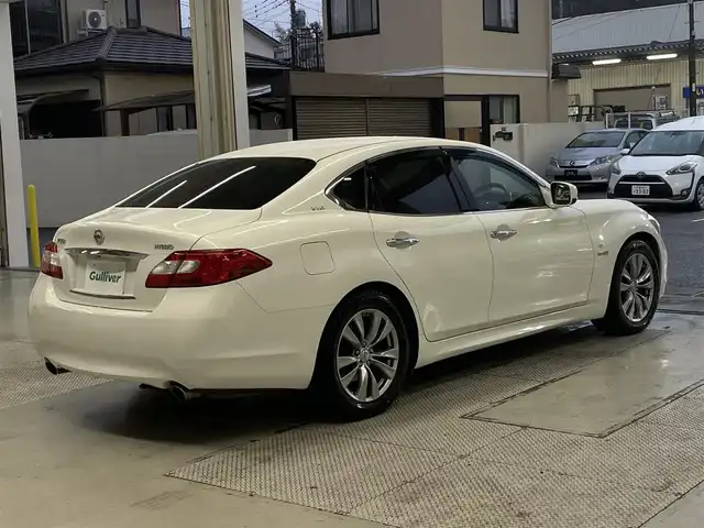 日産 フーガ ハイブリッド VIPパッケージ 千葉県 2012(平24)年 11.7万km クリスタルホワイトパール 純正ナビ(CD/DVD/地デジTV)/レザーシート/純正マット/レーダークルーズコントロール/前席シートヒーター/前席シートクーラー/運転席メモリシート/プッシュスタート/ドアバイザー/ドライブレコーダー/ビルトインETC/オートライト/フォグランプ(黄色)/リアサンシェード/HIDヘッドライト/左サイドカメラ/オールオートウィンドウ/電動チルトステアリング