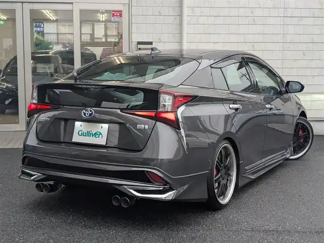 トヨタ プリウス A プレミアム 埼玉県 2020(令2)年 5.6万km グレーメタリック ＜外装＞/モデリスタエアロ(F、S、R)/ローダウン(ダウンサス)/ワーク19インチ アルミホイール/ヘッドライト純正加工品(LED)/マフラーカッター/TRDエアロドアミラーフィン/＜機能＞/エコグライダー(スロットルコントローラー)/ナビキャンセラー/HDMIポート入力端子/ワンタッチウインカー/純正ナビ(フルセグ/Bluetooth/CD/DVD/ラジオ)/シートヒーター/シートベンチレーター/クルーズコントロール(追従機能あり)/HUD(ヘッドアップディスプレイ)/ETC/ドラレコ/＜その他＞/スペアキー×2/純正ホイールあり（15インチ）