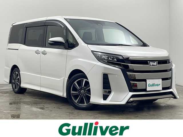 トヨタ ノア Si ダブルバイビー 秋田県 2019(平31)年 6.4万km ホワイトパールクリスタルシャイン 4WD/純正SDナビ　/フルセグTV/CD/DVD/Bluetooth/フリップダウンモニター　/両側パワースライドドア　/バックカメラ　/クルーズコントロール　/レーンキープアシスト/衝突被害軽減ブレーキ　/ビルトインＥＴＣ　/前後ドライブレコーダー/ＬＥＤヘッドライト　/フォグ/サンシェード/スペアキー/プッシュスタート/オートマチックハイビーム/寒冷地仕様