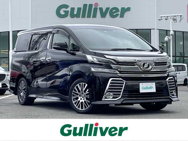 トヨタ ヴェルファイア Z Gエディション 佐賀県 2016(平28)年 7.8万km ブラック 純正9インチSDナビゲーション/・フルセグTV/CD/DVD/SD/Bluetooth/後席フリップダウンモニター/バックカメラ/前方ドライブレコーダー/ビルトインETC/両側パワースライドドア/リバース連動ドアミラー/電子パーキングブレーキ/AUTO HOLD機能/後席エアコン/パワーバックドア/ハーフレザーシート/DN席パワーシート(D席メモリー機能付)/N席＋セカンド席電動オットマン/キャプテンシート/後席サンシェード/ISOFIX対応/純正18インチアルミホイール/純正LEDヘッドライト/純正フォグランプ/純正フロアマット/純正ドアバイザ―/新車保証書/取扱説明書/クルーズコントロール/クリアランスソナー