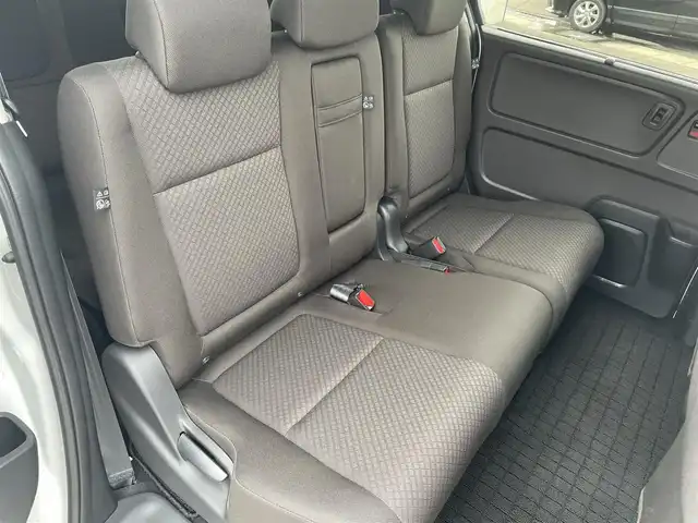 ホンダ フリード G 愛媛県 2023(令5)年 1.5万km プラチナホワイトパール 純正ナビ/AM/FM/CD/DVD/BT/バックカメラ　/両側電動ドア　/ホンダセンシング　/アダプティブクルーズコントロール　/車線逸脱防止装置/衝突被害軽減装置/ステアリングスイッチ　/D/N席シートヒーター　/電格ミラー/ヒートミラー　/ドラレコ　/ETC　/LEDヘッドライト/フロントワイパーデアイサー/現状サマー(鉄)(185/65/R15)