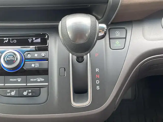 ホンダ フリード G 愛媛県 2023(令5)年 1.5万km プラチナホワイトパール 純正ナビ/AM/FM/CD/DVD/BT/バックカメラ　/両側電動ドア　/ホンダセンシング　/アダプティブクルーズコントロール　/車線逸脱防止装置/衝突被害軽減装置/ステアリングスイッチ　/D/N席シートヒーター　/電格ミラー/ヒートミラー　/ドラレコ　/ETC　/LEDヘッドライト/フロントワイパーデアイサー/現状サマー(鉄)(185/65/R15)