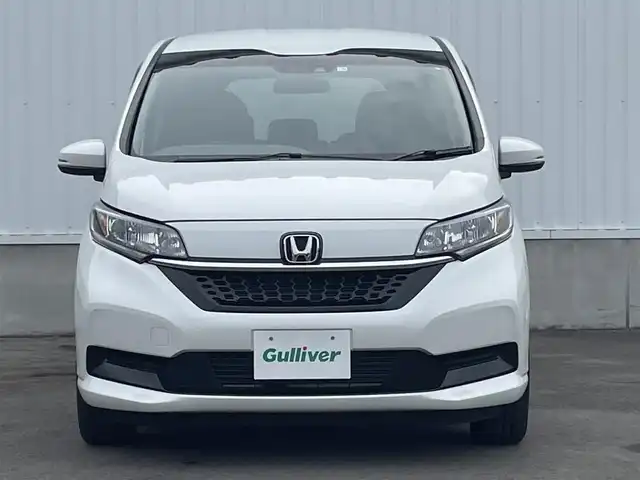 ホンダ フリード G 愛媛県 2023(令5)年 1.5万km プラチナホワイトパール 純正ナビ/AM/FM/CD/DVD/BT/バックカメラ　/両側電動ドア　/ホンダセンシング　/アダプティブクルーズコントロール　/車線逸脱防止装置/衝突被害軽減装置/ステアリングスイッチ　/D/N席シートヒーター　/電格ミラー/ヒートミラー　/ドラレコ　/ETC　/LEDヘッドライト/フロントワイパーデアイサー/現状サマー(鉄)(185/65/R15)