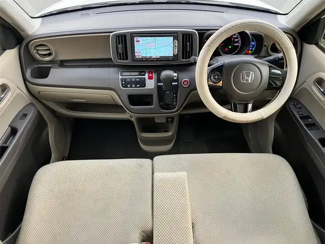 ホンダ Ｎ ＯＮＥ G Lパッケージ 静岡県 2013(平25)年 6万km プレミアムホワイトパール エンジンスタートボタン/パワーステアリング/パワーウィンドウ/アイドリングストップ/スマートキー/オートエアコン/ETC/純正メモリナビ（CD/DVD/BT/ワンセグ）/ベンチシート/バックカメラ/純正フロアマット/ABS/横滑り防止装置/盗難防止装置/オートライト/W＋サイドエアバック/カーテンエアバック