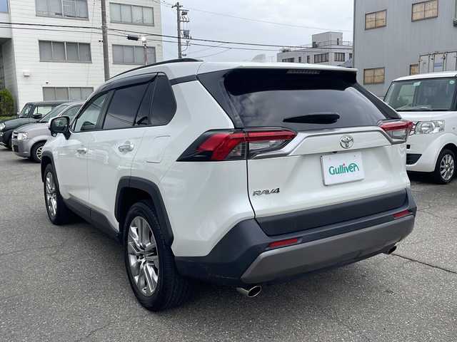トヨタ ＲＡＶ４ G Zパッケージ 福井県 2021(令3)年 4.7万km ホワイトパールクリスタルシャイン 4WD/社外メモリナビゲーション/（CD/DVD/BT）/フルセグテレビ/バックカメラ/プリクラッシュセーフティ/アダプティグクルーズコントロール/レーンキープアシスト/純正19インチアルミホイール/ブラインドスポットモニター/パワーバックドア/黒革シート/パワーシート /（メモリ付き）/シートヒーター/LEDヘッドライト/フォグランプ/ETC/ルーフレール/ステアリングヒーター/オートリトラミラー/オートライト/クリアランスソナー /オートハイビーム/保証書/取扱説明書