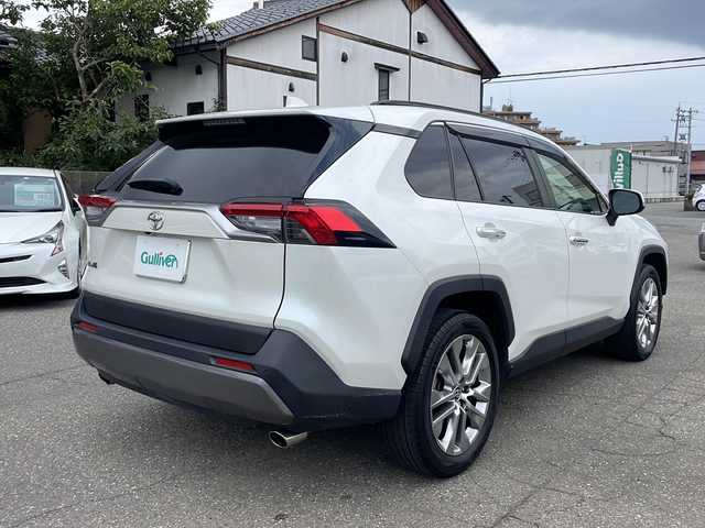 トヨタ ＲＡＶ４ G Zパッケージ 福井県 2021(令3)年 4.7万km ホワイトパールクリスタルシャイン 4WD/社外メモリナビゲーション/（CD/DVD/BT）/フルセグテレビ/バックカメラ/プリクラッシュセーフティ/アダプティグクルーズコントロール/レーンキープアシスト/純正19インチアルミホイール/ブラインドスポットモニター/パワーバックドア/黒革シート/パワーシート /（メモリ付き）/シートヒーター/LEDヘッドライト/フォグランプ/ETC/ルーフレール/ステアリングヒーター/オートリトラミラー/オートライト/クリアランスソナー /オートハイビーム/保証書/取扱説明書
