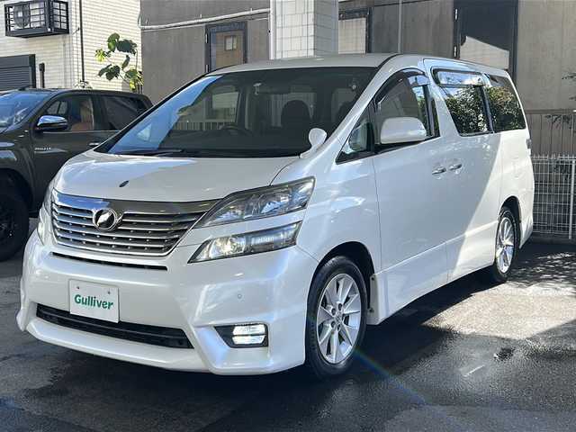 トヨタ ヴェルファイア 2．4Z 京都府 2011(平23)年 5.1万km ホワイトパールクリスタルシャイン 純正8インチナビ/フリップダウンモニター/デジタルインナーミラー/純正エアロ/ワンセグテレビ/クリアランスソナー/ワンオーナー/ドライブレコーダー前後/バックカメラ/オールオートウィンド/プッシュスタート/ビルトインETC/両側パワースライドドア/電動格納ミラー/ウィンカーミラー