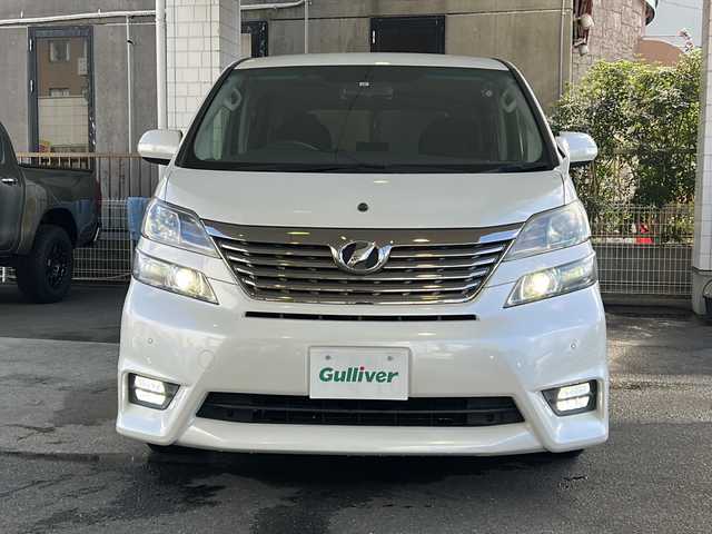 トヨタ ヴェルファイア 2．4Z 京都府 2011(平23)年 5.1万km ホワイトパールクリスタルシャイン 純正8インチナビ/フリップダウンモニター/デジタルインナーミラー/純正エアロ/ワンセグテレビ/クリアランスソナー/ワンオーナー/ドライブレコーダー前後/バックカメラ/オールオートウィンド/プッシュスタート/ビルトインETC/両側パワースライドドア/電動格納ミラー/ウィンカーミラー