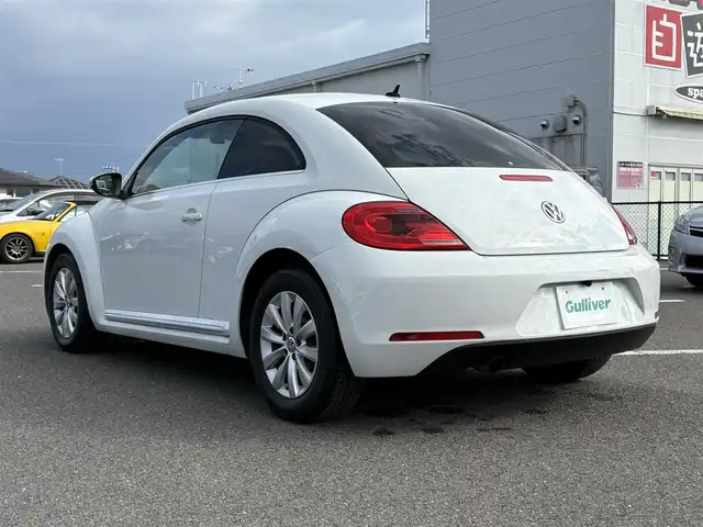 フォルクスワーゲン ザ・ビートル デザイン 大分県 2016(平28)年 7.4万km ピュアホワイト ・ナビ(CD/DVD/BT/AUX/SD)/・バックカメラ/・フルセグテレビ/・ドライブレコーダー/・ETC/・クルーズコントロール/・MTモード付AT/・オートライト/・スマートキー/・プッシュスタートボタン/・フロアマット