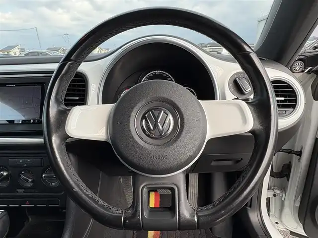 フォルクスワーゲン ザ・ビートル デザイン 大分県 2016(平28)年 7.4万km ピュアホワイト ・ナビ(CD/DVD/BT/AUX/SD)/・バックカメラ/・フルセグテレビ/・ドライブレコーダー/・ETC/・クルーズコントロール/・MTモード付AT/・オートライト/・スマートキー/・プッシュスタートボタン/・フロアマット