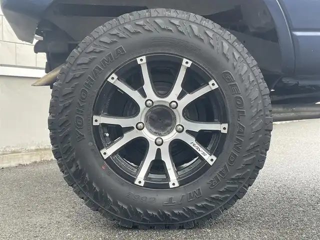 スズキ ジムニー XG 山形県 2014(平26)年 7.2万km ノクターンブルーパール 禁煙車/リフトアップ/5速マニュアル/4WD/社外ナビ/・ワンセグ/CD/DVD/AUX/Bluetooth/横滑り防止装置/盗難防止装置/フロアマット/フォグライト/リモコンキー/インチアップ/社外フロントバンパー/社外エアクリーナー/社外AW（RAYS）/ETC